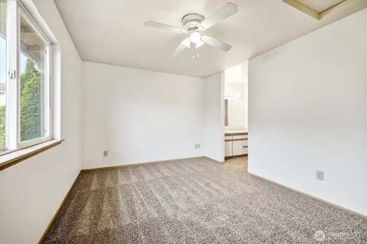 Primary bedroom, main floor. Primary bedroom, main floor.