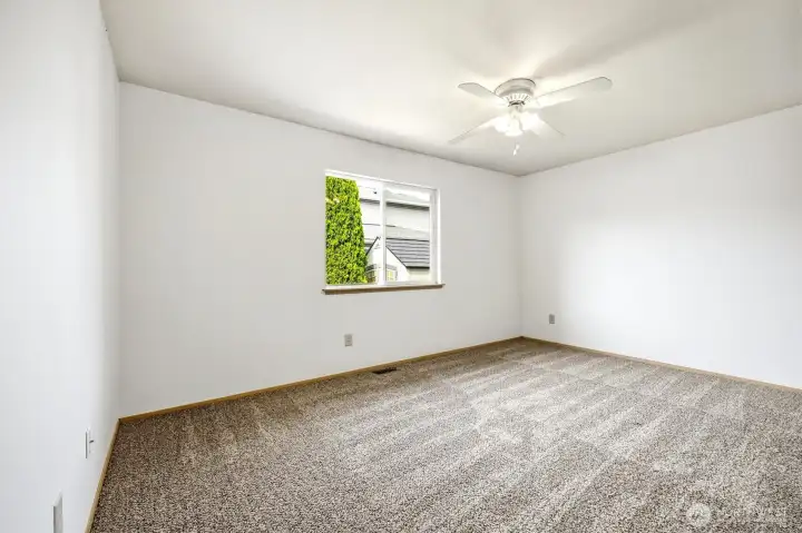 Primary bedroom, main floor. Primary bedroom, main floor.