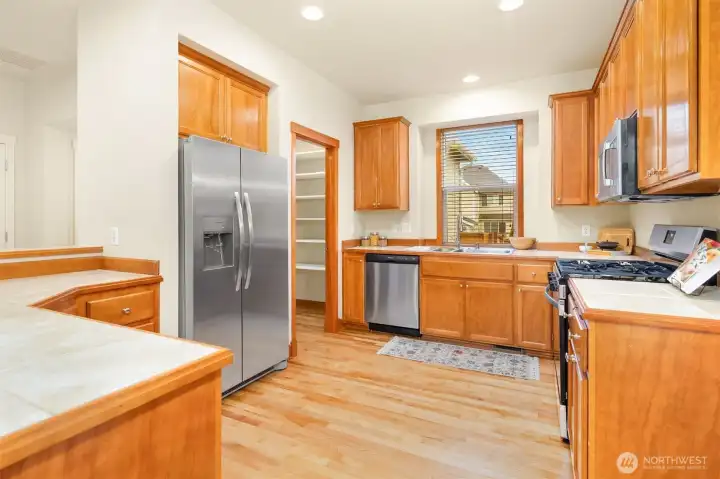 Plenty of counterspace and new stainless steel appliances.
