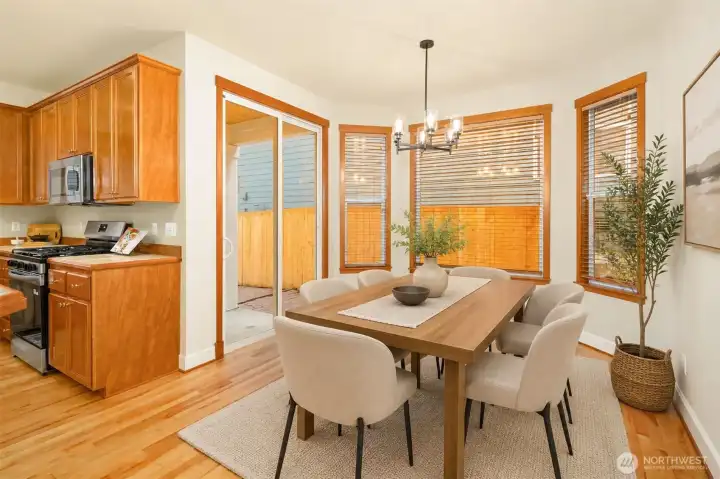 Light-filled dining space off the kitchen (virtually staged)