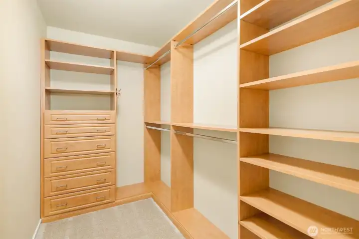Organization a breeze with the upgraded primary walk-in closet.