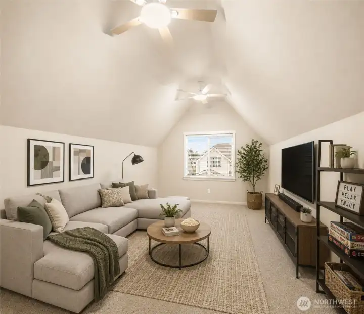 Spacious bedroom or cozy bonus room - you decide, with two new ceiling fans for comfort (virtually staged)