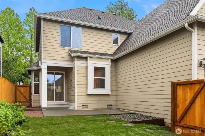 Enjoy summer days in your yard with plenty of patio space.