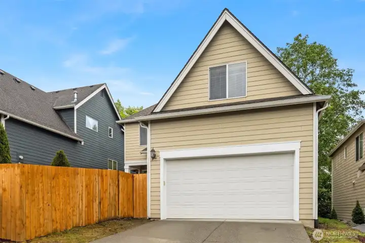 Large 2 car garage with built in cabinets