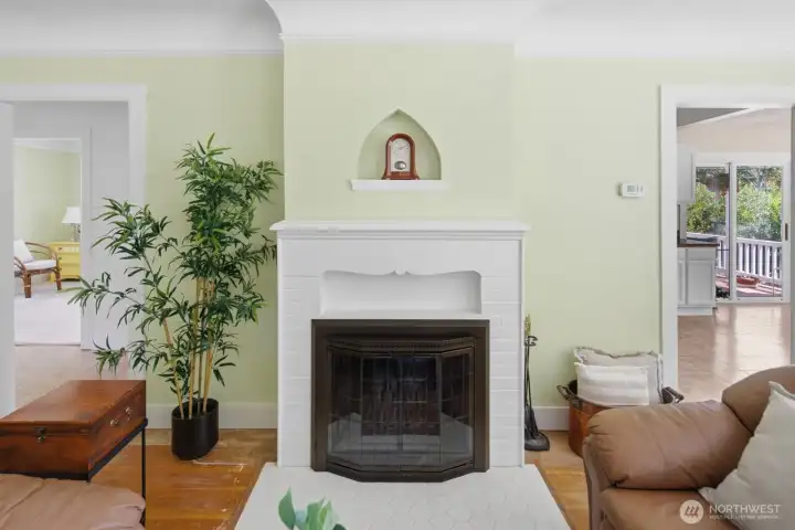 Stunning fireplace with period mantel, tile hearth, & original wall niche Stunning fireplace with period mantel, tile hearth, & original wall niche
