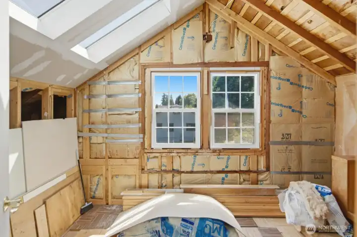 The second upstairs bedroom is approximately 80% renovated, offering an opportunity to add your finishing touches. The second upstairs bedroom is approximately 80% renovated, offering an opportunity to add your finishing touches.