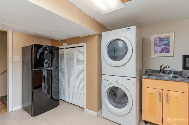 Lower level has laundry and a small kitchen.
