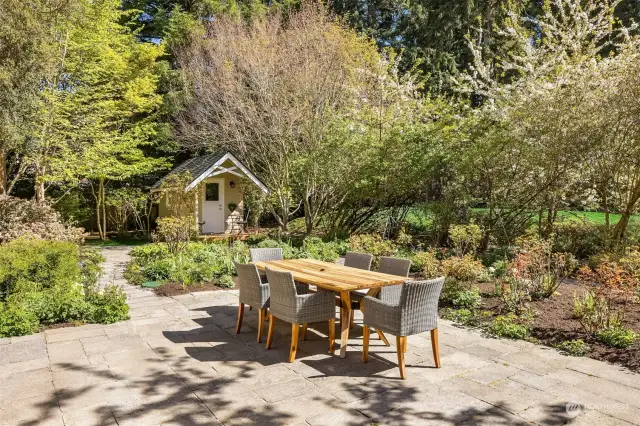 Wait until you see this yard! Multiple outdoor seating and dining areas including right here.