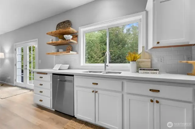 Kitchen Looks Out to Back Yard