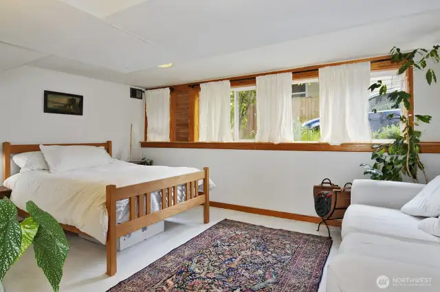 Lower level bedroom, good size- could fit a guest room and an office.