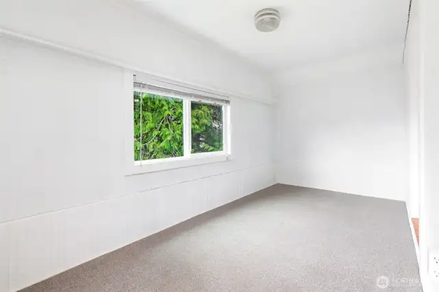 The extra finished space- this space is carpeted. New windows on this floor.