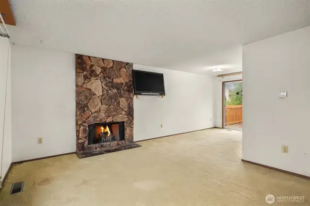 Wood-burning fireplace is a focal point.