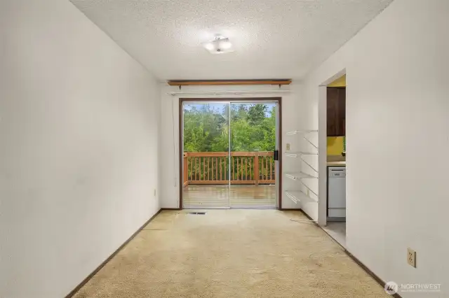 Dining room with pass through to back deck.
