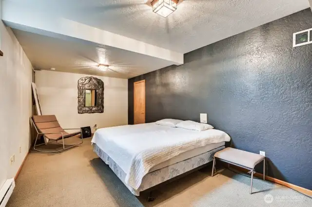 FINISHED BASEMENT BEDROOM WITH FULL BATH AND AMPLE ROOM INCLUDING WALK IN CLOSET