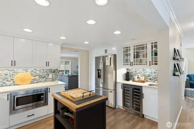 No detail was overlooked in the kitchen upgrades. Deluxe features like this built-in microwave below the counter add to the design.