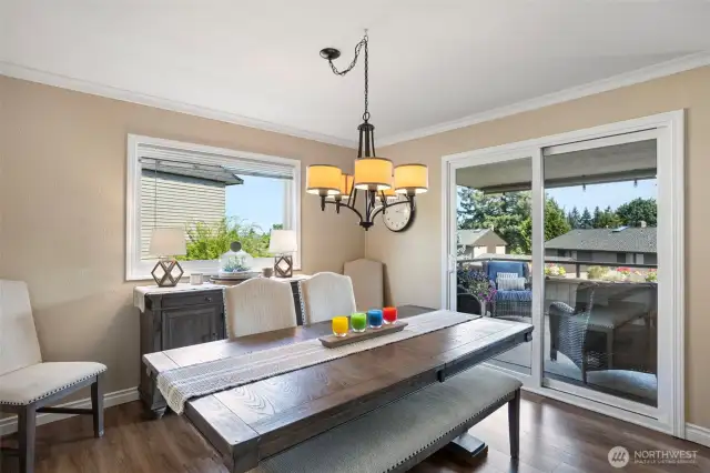 A large picture window in the dining room is an added bonus! This newly installed window expands the views and fills the room with additional light.