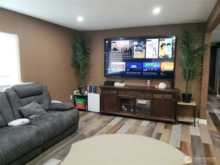 An Opposite view of the Huge Entertaining Living Room Showing a great space for an Entertainment Center.