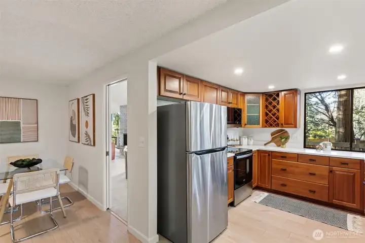 The kitchen has a brand-new stainless-steel dishwasher, new stainless range/oven, a newer LG microwave hood and stainless-steel refrigerator.
