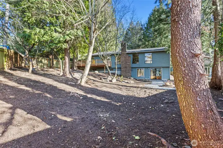 View of rear of home from private backyard.