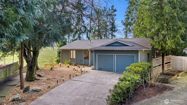 Front of home with park in the background.