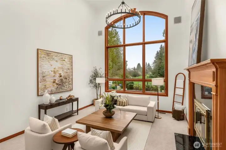 You are immediately enveloped by nature in the 19 foot vaulted great room with soaring Pella windows.