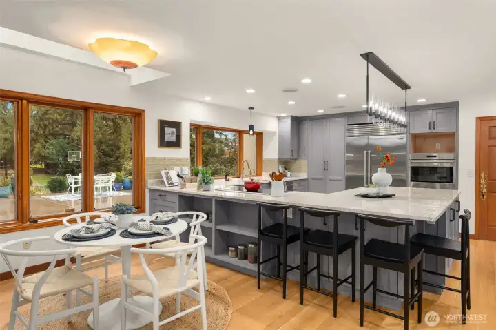 Enjoy the ease of cooking in this oversized kitchen appointed with top-of-the-line appliances.