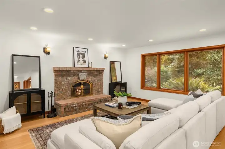 Cozy up at the fire in the living room.