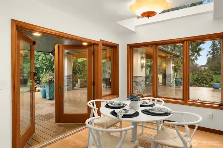 Enjoy indoor outdoor living with oversized French doors out to your deck