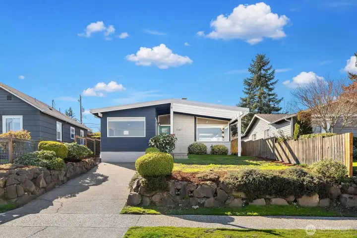 Elevated from street level in the front. You'll have ample off street parking in the long driveway in front as well as parking for multiple vehicles including space for an RV in the back.