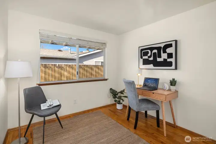 The third bedroom with the closet on the left not shown in the photo.