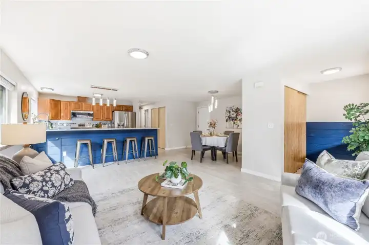 View from the living room looking towards the kitchen with counter dining space.