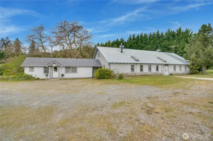 To the left is the guest cottage and the right is the large shop.