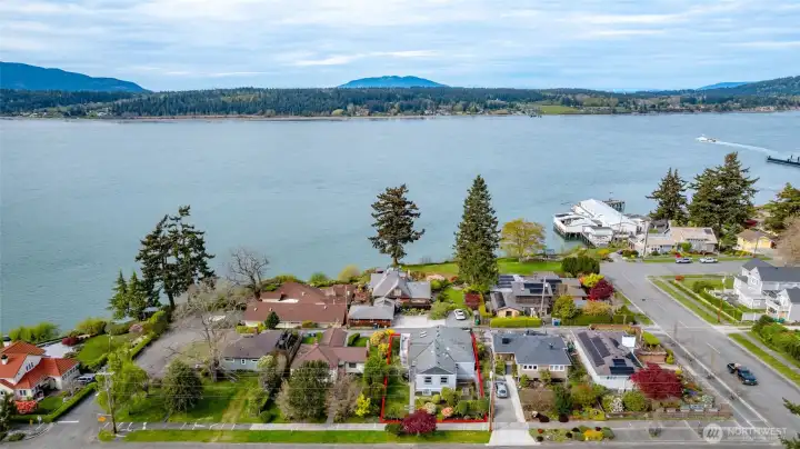 Welcome home to 2010 9th Street in gorgeous Old Town, Anacortes. View of Guemes Channel from the open main level plan and deck.
