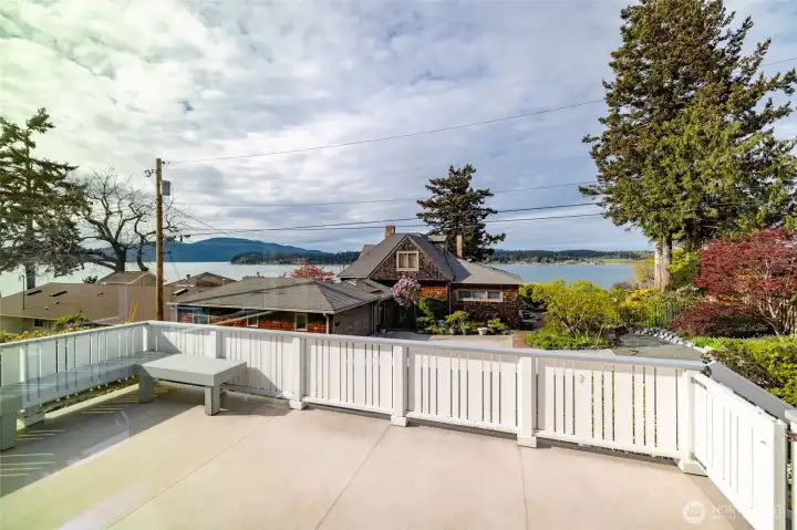 The deck off of the main living area with views out to Guemes Channel and islands beyond.