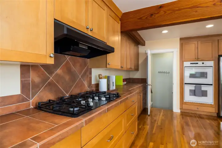 Five burner gas stove for easy entertaining and home cooking.