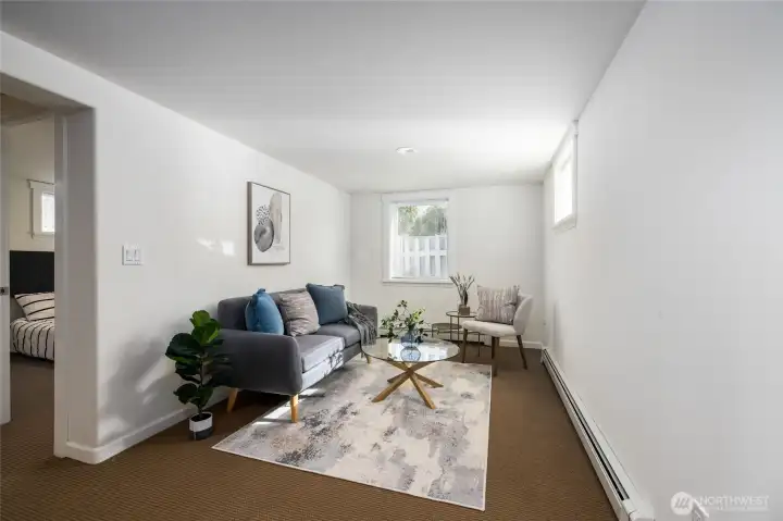 Downstairs sitting area with lots of light.
