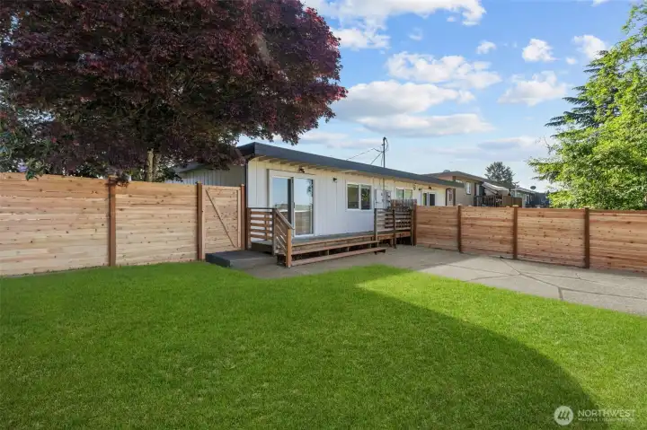 virtually staged prior to landscaping job that is now completed.