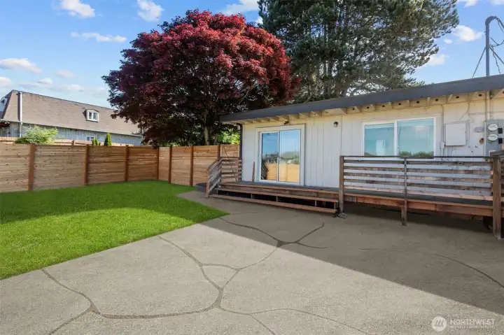 virtually staged prior to landscaping job that is now completed.