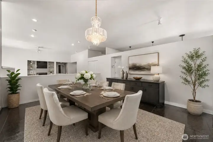 Virtually staged step-up dining room. Virtually staged step-up dining room.