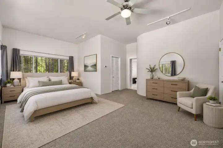 Virtually staged primary bedroom. Virtually staged primary bedroom.