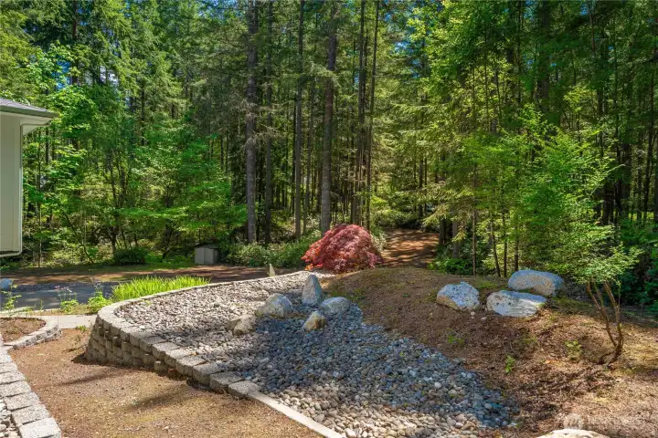 Trails meander through your woods, perfect for peaceful walks. Trails meander through your woods, perfect for peaceful walks.