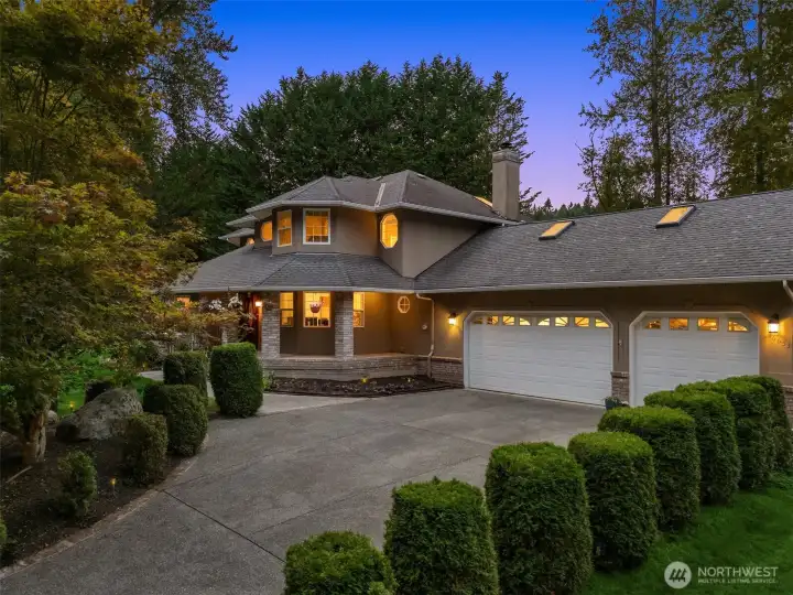 Charming covered front porch—perfect for morning coffee or evening relaxation.