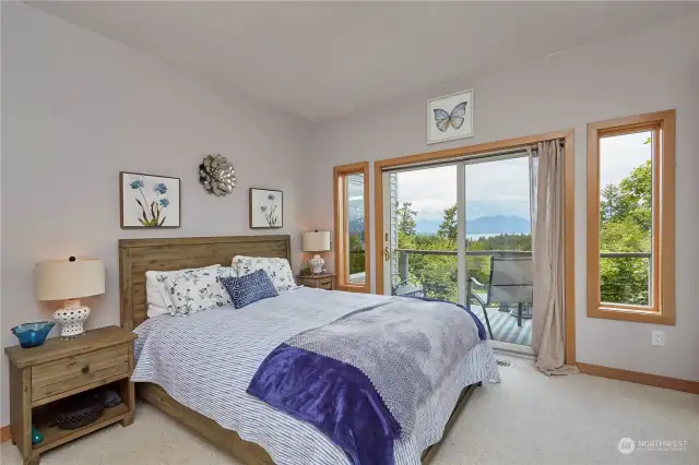 Upstairs bedroom! You could live comfortably just on the upper level of this stunning home. Private deck for your morning coffee or to take in those late summer sunsets!