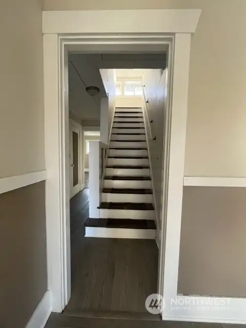 Livingroom leading to upstairs