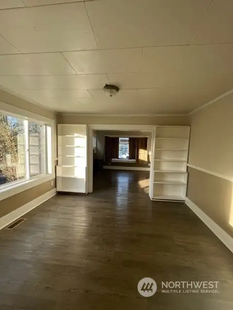 Dining room- with   built-ins, plenty of natural light