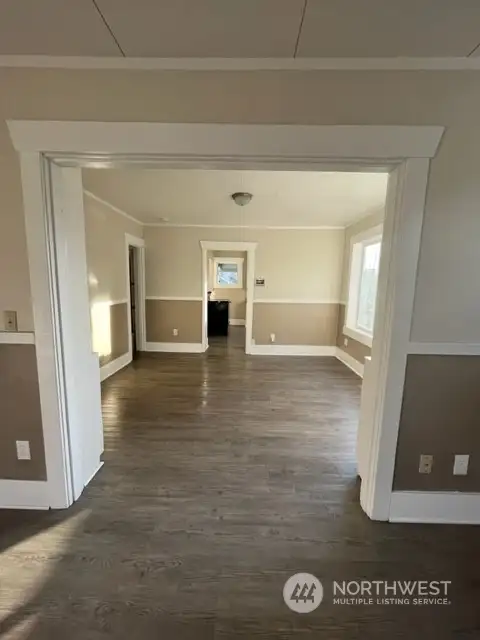 Dining room- with   built-ins, plenty of natural light