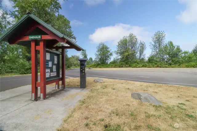 Trailhead parking and bathroom across street from lake.