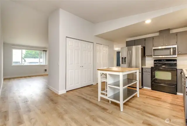 The kitchen is open to the family room and storage and the corner is the living room