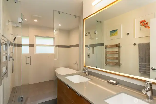 Luxuriously updated main bath with heated floors and soaking tub.