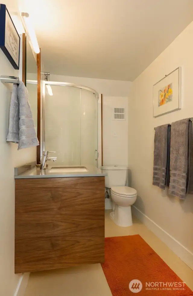 Chicly remodeled lower bathroom.